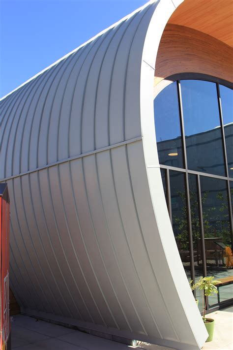 metal curve roof house|residential curved metal roof.